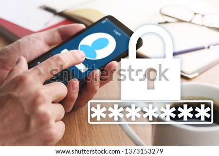 Password of smartphone account concept.
Closeup of male hands touching smartphone screen to sign in.
