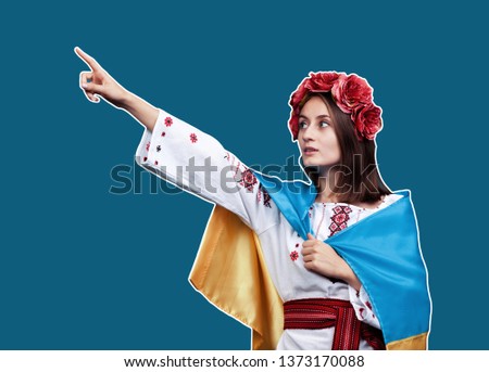 Ukraine patriotic concept. Beautiful girl in the Ukrainian national suit with Ukrainian flag. Magazine style collage with copyspace