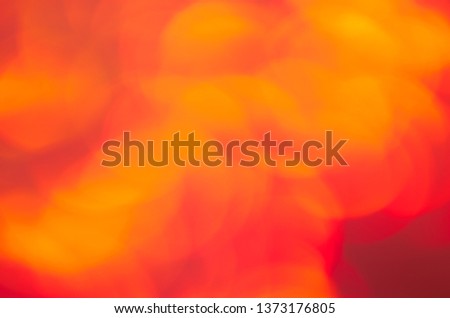 Christmas Background. Abstract Red-Golden Background With Bokeh Effect