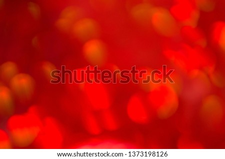 Red Defocused Background. Red tone blurred bokeh lights.