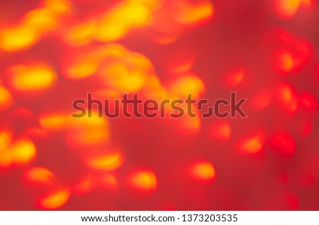 Abstract Red-Yellow Glowing Background. Yellow Light Bokeh 