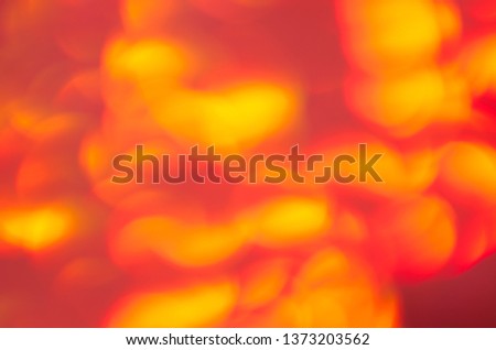 Abstract Red-Yellow Glowing Background. Yellow Light Bokeh 