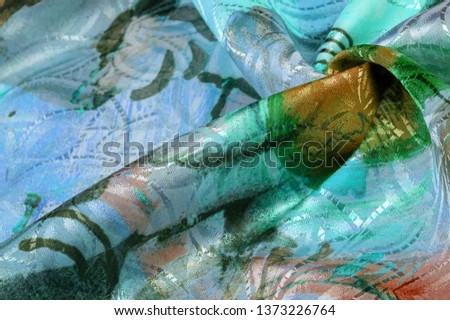texture, background, pattern, wallpaper, postcard, poster, silk fabric with a painted artist's palette, bright colors, colors, unrestrained imagination - this is what you need for your  projects