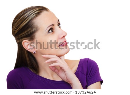 Beautiful young woman  looks upwards.  isolated on a white background