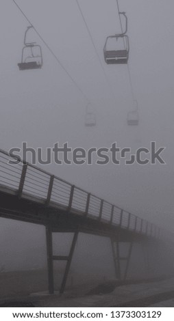 cable car place on a fogy misty day