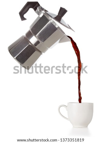 coffee poured from a flying moka into a cup isolated on white Royalty-Free Stock Photo #1373351819