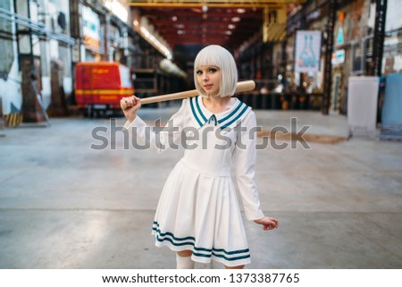 Cute anime style blonde girl with baseball bat