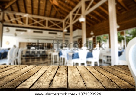 Wooden table background of free space for your decoration and restaurant interior. Summer time. 