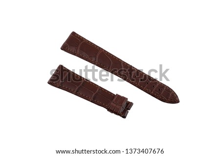Brown, leather watchband stitched at the edges, isolated on white background. 