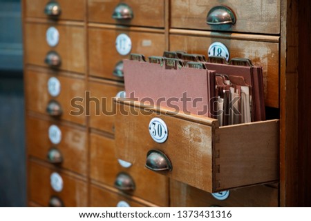 Old cabinet filing cabinet Royalty-Free Stock Photo #1373431316