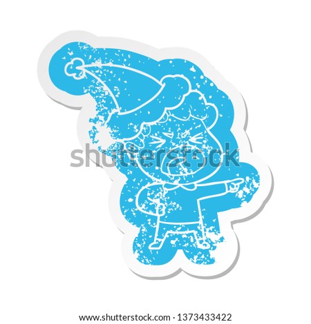 quirky cartoon distressed sticker of a furious man wearing santa hat