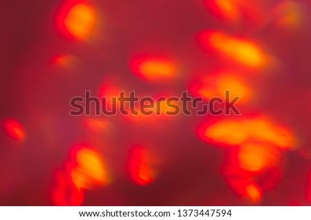 Yellow Light Bokeh. Abstract Red-Yellow Glowing Background. 