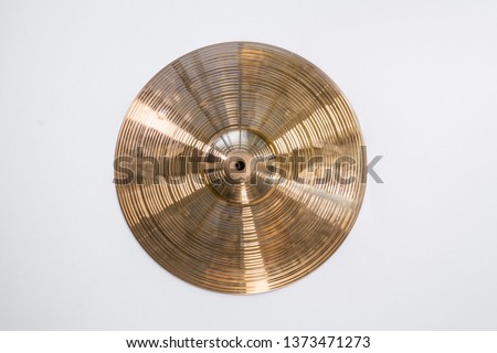 Drum plate, drum set on a white background, musical cymbals top view Royalty-Free Stock Photo #1373471273