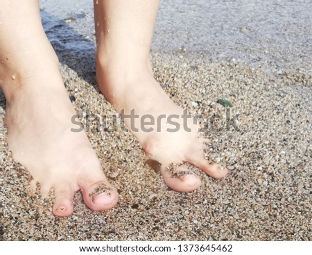 barefoot at the seaside
