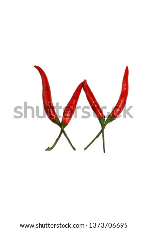 Alphabet of hot spice cayenne chili peppers isolated on white. Vegetable chili peppers in shape of letter W, for making words and logo