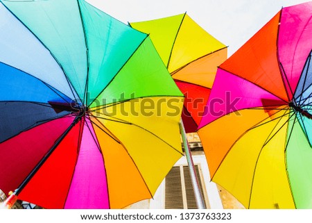 Colorful umbrellas to use as a background in bright and cheerful ideas.