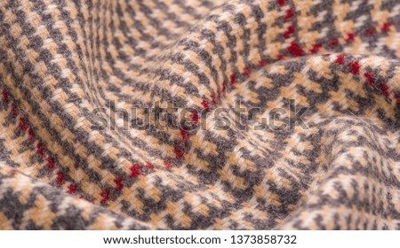 Background texture, pattern. The fabric is thick, warm in a cage, beige. This is 100% wool terry dressing. Sinil has a soft pile and is very versatile. It fits your design.