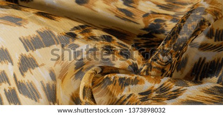 background pattern African fabric with silk print with tiger print. 