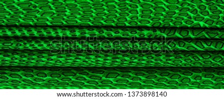 green silk fabric, animal skin.