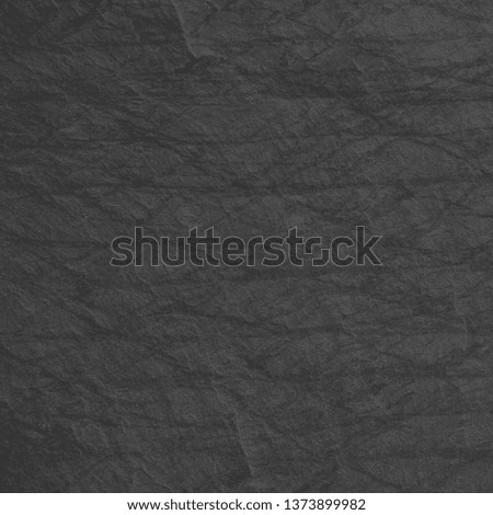 Dark grey black slate background or texture.
