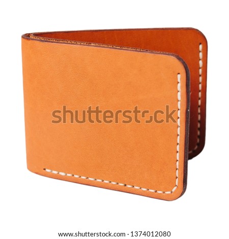 Leather accessories on a white background, wallets, coin boxes and straps, isolated