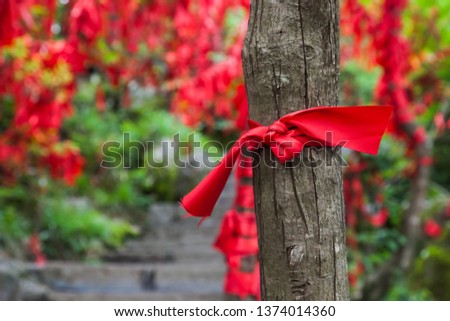 Red ribbons on pathway in Tianmenshan nature park - China - travel background