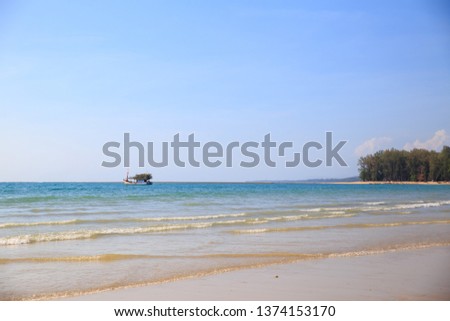 Beautiful summer landscape with a ship above the sea in the Phuket province in Thailand.