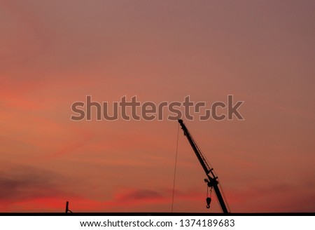 construction site  silhouette on sunset background

