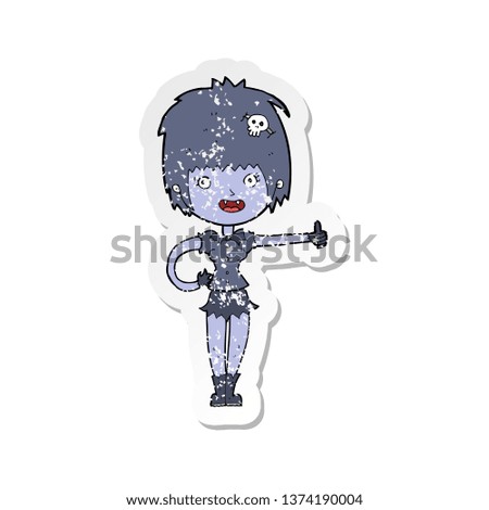 retro distressed sticker of a cartoon vampire girl giving thumbs up sign