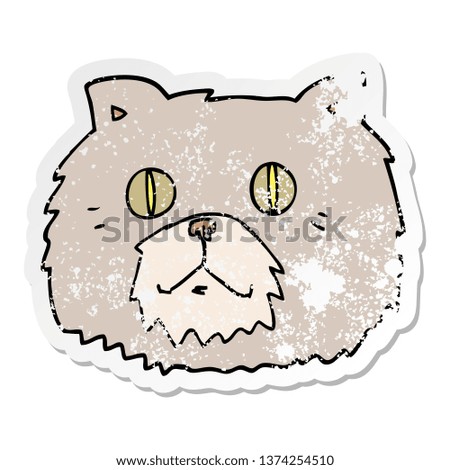 distressed sticker of a cartoon cat face