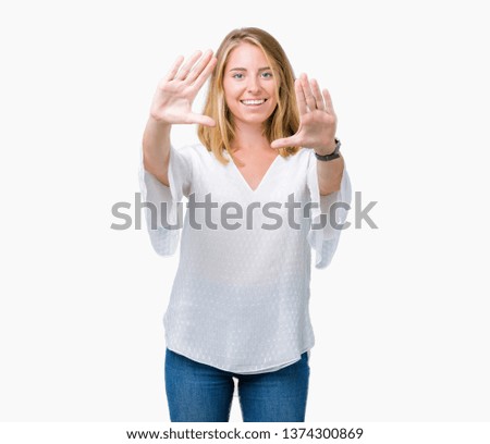 Beautiful young elegant woman over isolated background Smiling doing frame using hands palms and fingers, camera perspective