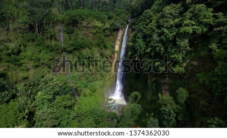 waterfall in the middle of forest. Destination of nature in Indonesia for tourist and traveller