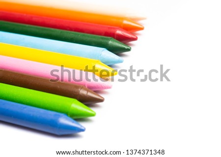 Colorful wax crayons collection isolated on white background. Colorful multi colored crayons for school ,kids and professional use.