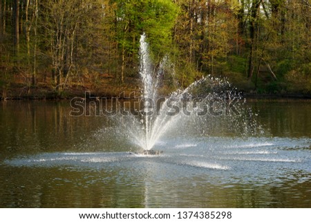 Water fountain at a pond near Carousel Park, Pike Creek, Delaware, U.S.A
