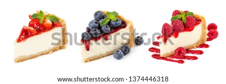 Set of cheesecakes with fresh berries and mint isolated on white background Royalty-Free Stock Photo #1374446318