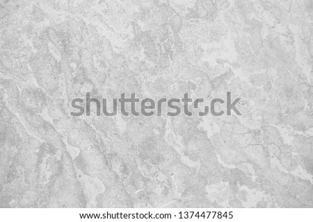 Closeup of beautiful stone texture wall in light grey tone for rough surface and modern background, interior and marble decoration. Cool banner on page, cover, and website. Monochrome seamless pattern