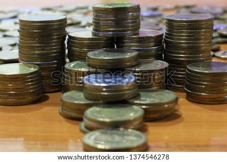 coins on wooden table