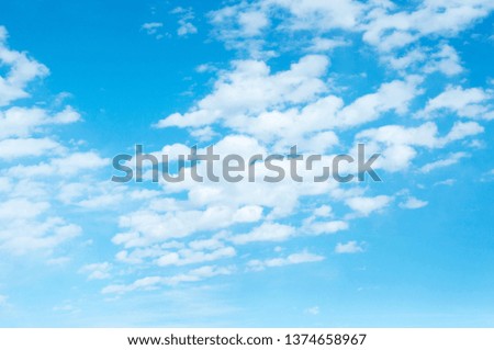 Blue sky background with clouds. Sky in April month