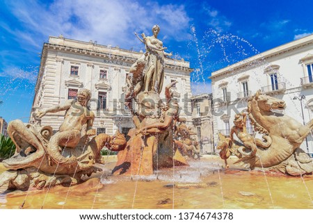 Siracusa, Sicily island, Italy: Diana Fountain in Archimedes Square, Ortigia, Syracuse, a historic city on the island of Sicily, Italy Royalty-Free Stock Photo #1374674378