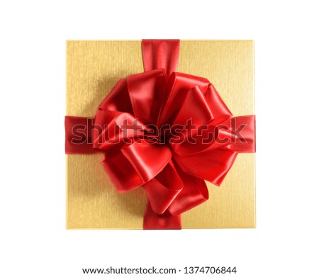 Top view golden gift box with red ribbon. Isolated on a white background