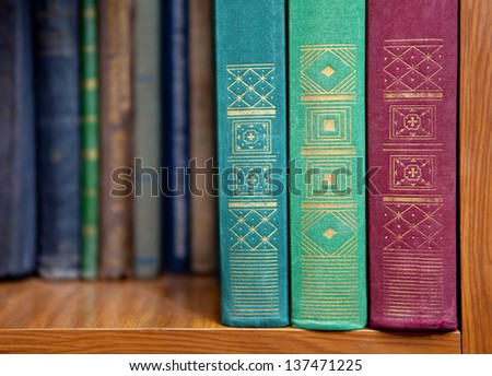 stack of books on a shelf