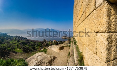 Impressive Ancient Heracleia ruins in Bafa Lake National Park Turkey . Milas, Aydin, Turkey. Besparmak Mountains. Landscape from Temple of Athena. Royalty-Free Stock Photo #1374753878