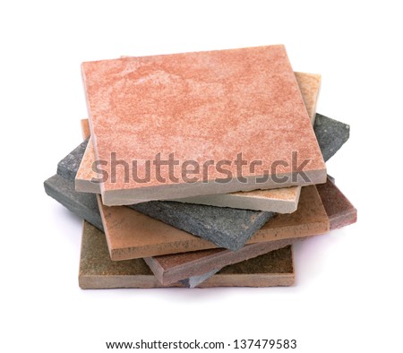 Stack of various stone tiles isolated on white Royalty-Free Stock Photo #137479583