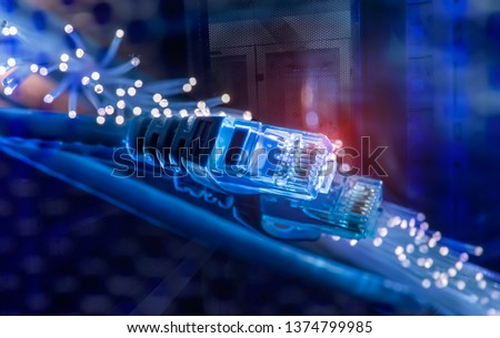 network cables with fiber optical background Royalty-Free Stock Photo #1374799985