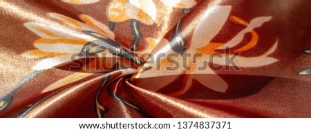 Texture, background, pattern, silk fabric of brown color with a floral print, exquisite color will give your project grace and elegance, the photo is made in bright light
