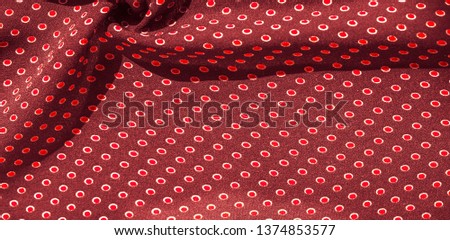 Texture background, pattern, red silk fabric with red polka dots. Light and silky-soft satin pendant is perfect for your design, online projects. It is also perfect for screensavers and wallpapers