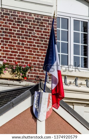french flag on a town hall