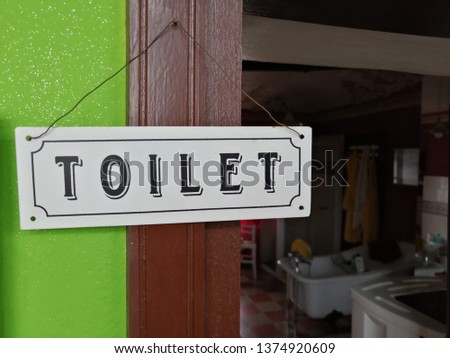Signage for the bathroom
