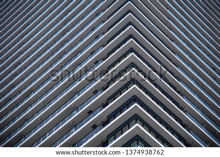 Building in the center of the city of japan.architecture, background, modern, city, white, black, architectural, structure, empty, contemporary,    beautiful, photography. Royalty-Free Stock Photo #1374938762