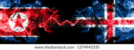 North Korea vs Iceland, Icelandic smoky mystic flags placed side by side. Thick colored silky smoke flags of North Korea and Iceland, Icelandic.